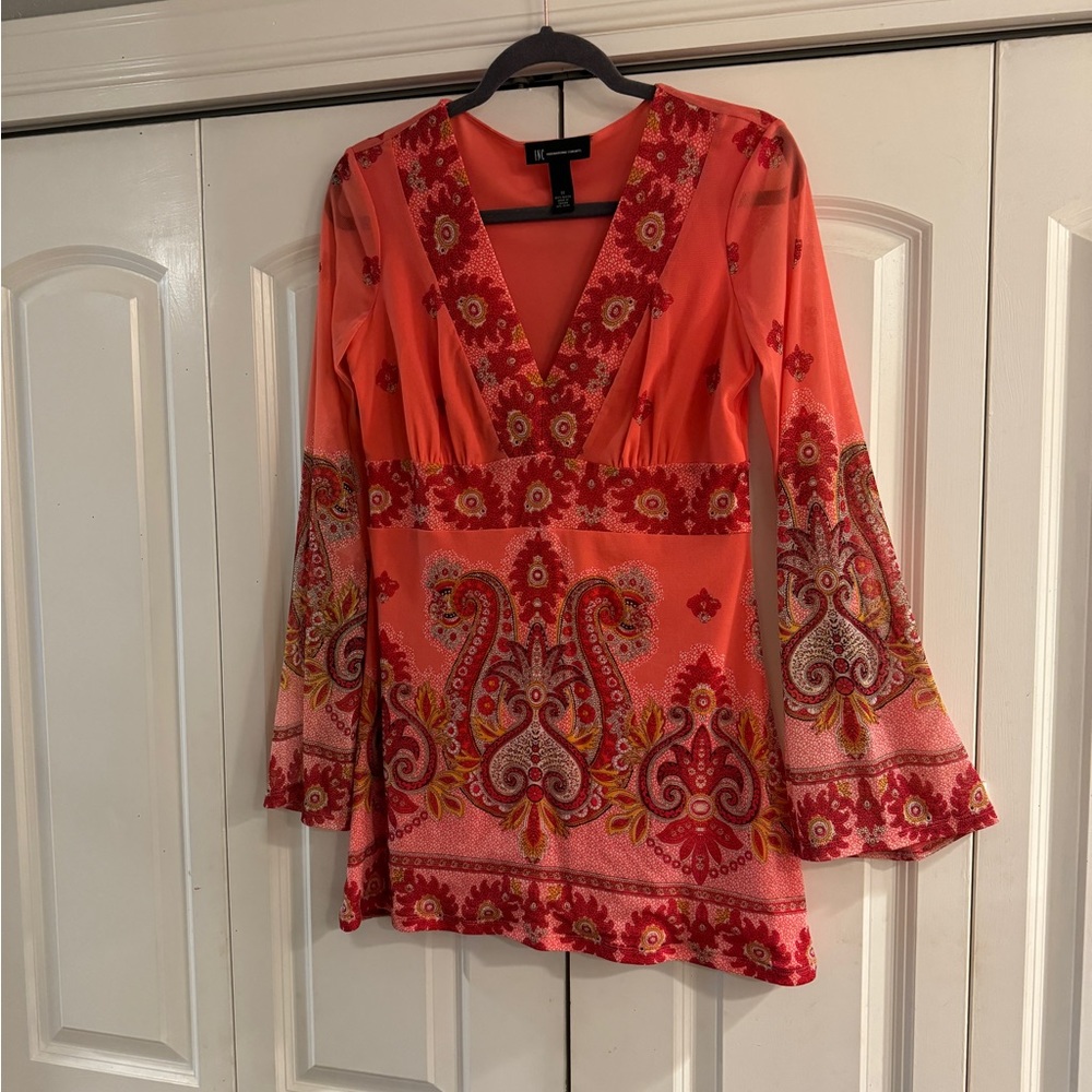 INC coral top.size M .slight bell sleeves.